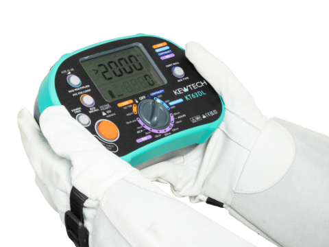 Electrician testing with the KT63DL wearing electrical gloves